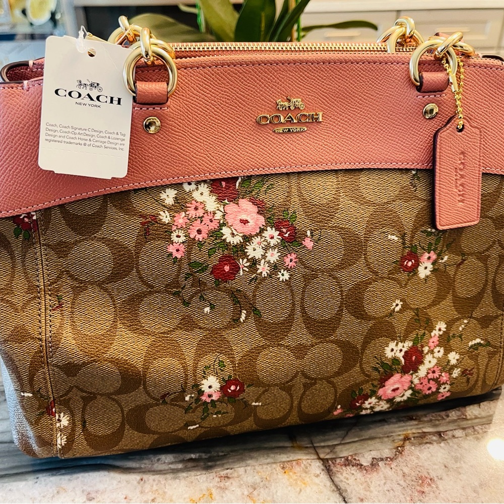 Coach brand n3w with tags ! , tan, brown white pink, maroon Coach bag.